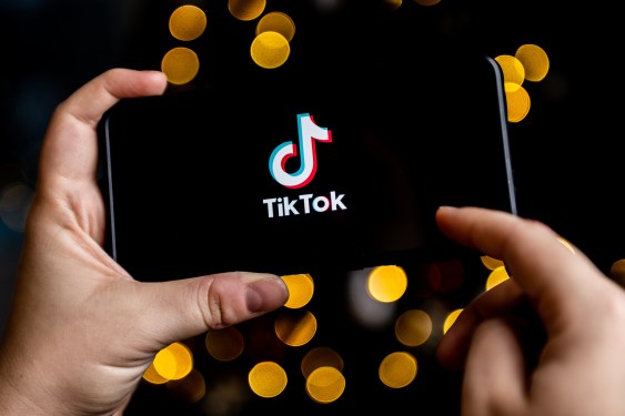 TikTok Usage Shows Signs of Slowing Down, and TikTok Shop May Be a Contributing Factor tiktok logo on phone